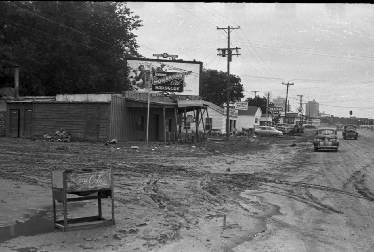 #85 Flood scenes of commercial and residential buildings, 1949