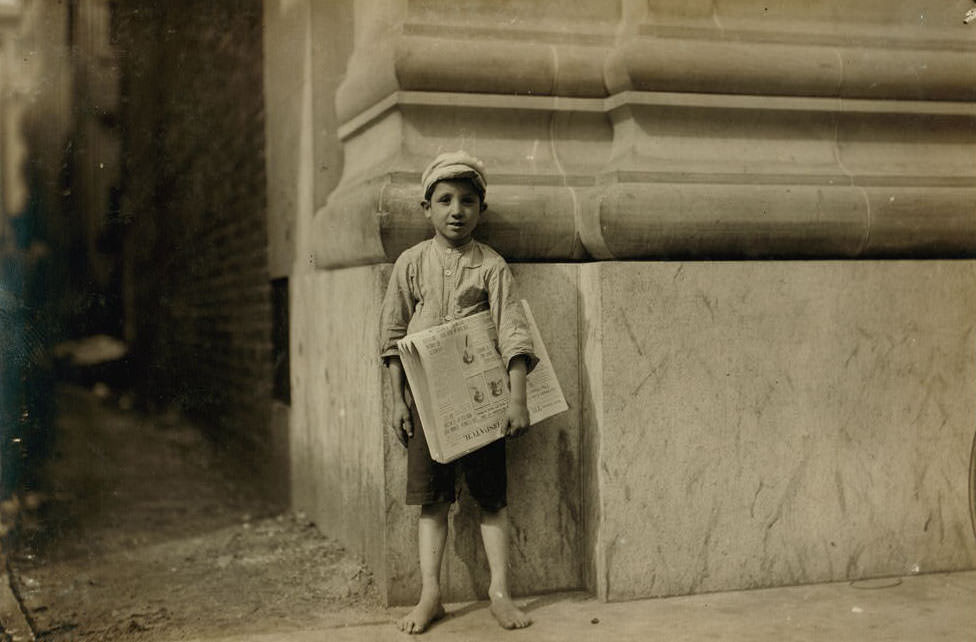 #10 Dominick, a young Norfolk newsboy. There are too many youngsters selling papers in Norfolk, Virginia, 1911