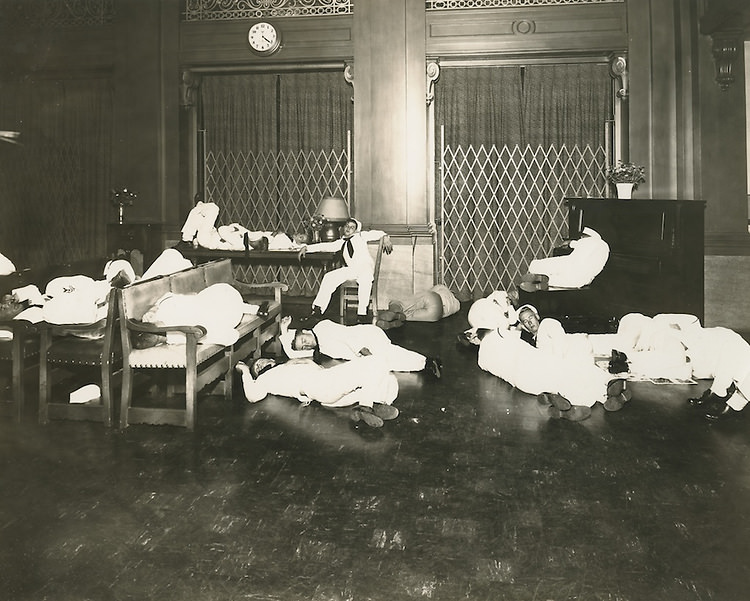 #117 Sailors sleeping in lobby of Navy YMCA.Future Union Mission building.Dunford’s Studio, 1940s