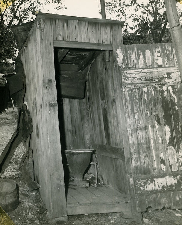 #130 Slum Conditions. Outdoor plumbing, 1950s