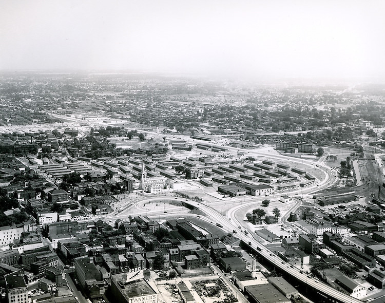 #142 Aerial view of Civic Center site prior to construction, 1958