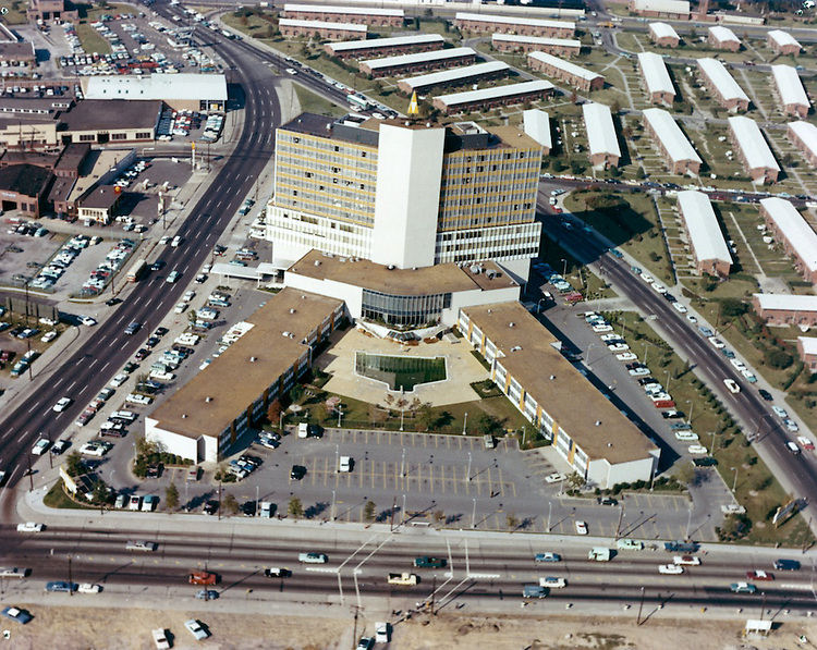#93 Redevelopment.Downtown North.Golden Triangle Hotel.Young Park on right. April 04, 1964