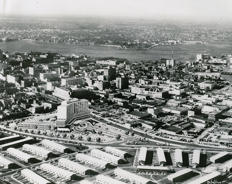 #48 View looking at Golden Triangle site with rendering on building superimposed on site, 1970s