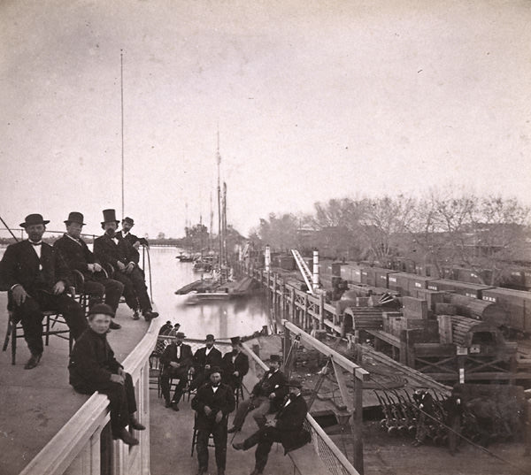 #113 The Levee and Central Pacific Railroad Freight Trains, Sacramento, 1870