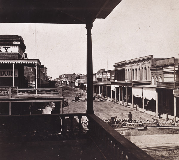 #118 Sacramento. J Street, from Sixth Street. Laying the Nicolson Pavement, 1870