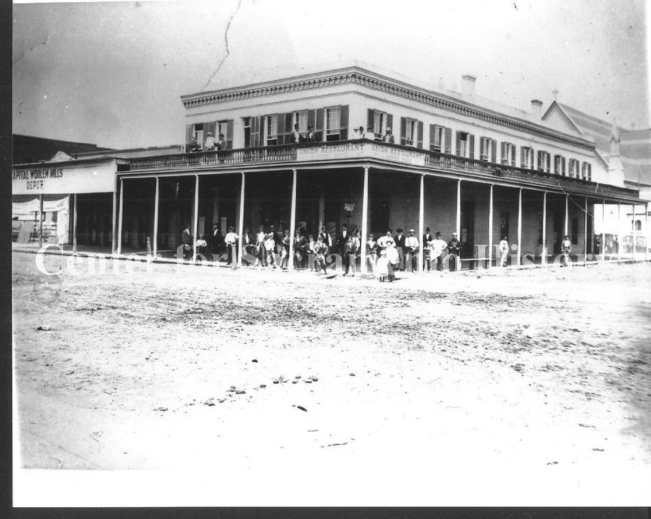 #74 View of the California State Capitol building from 2 blocks away and looking southeast, 1870