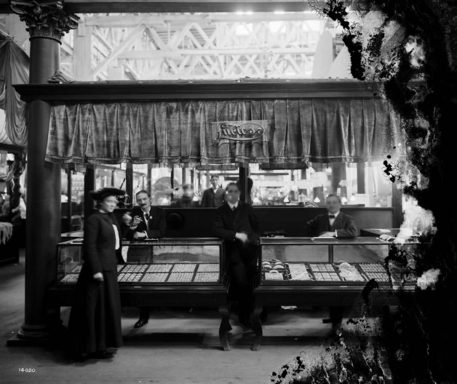 #134 Staff from Lucio’s show jewelry to potential customers in the Palace of Manufactures at the Louisiana Purchase Exposition, 1904