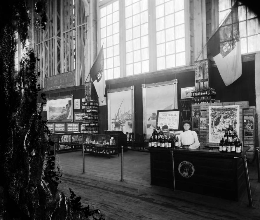 #159 A woman served port, white and red wines to exhibit visitors at Portugal’s wine exhibit in the Palace of Agriculture at the Louisiana Purchase Exposition, 1904
