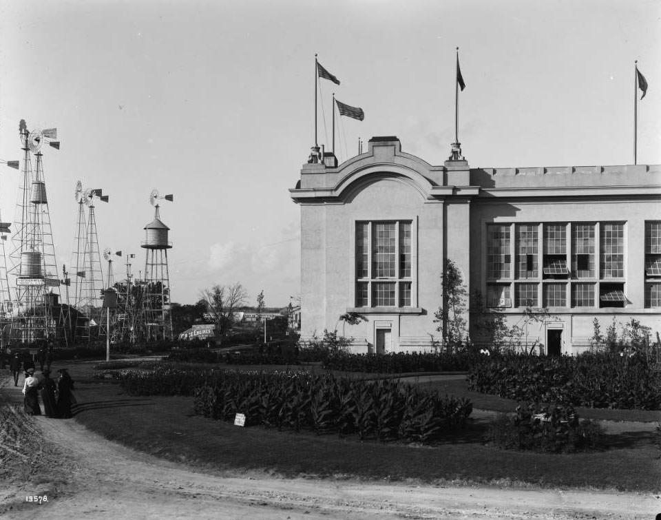 #178 Fairgoers stroll around the outside exhibits by the Agriculture building at the Louisiana Purchase Exposition, 1904