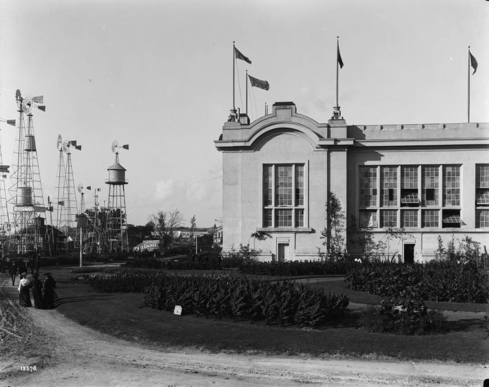 #179 Fairgoers stroll around the outside exhibits by the Agriculture building at the Louisiana Purchase Exposition, 1904