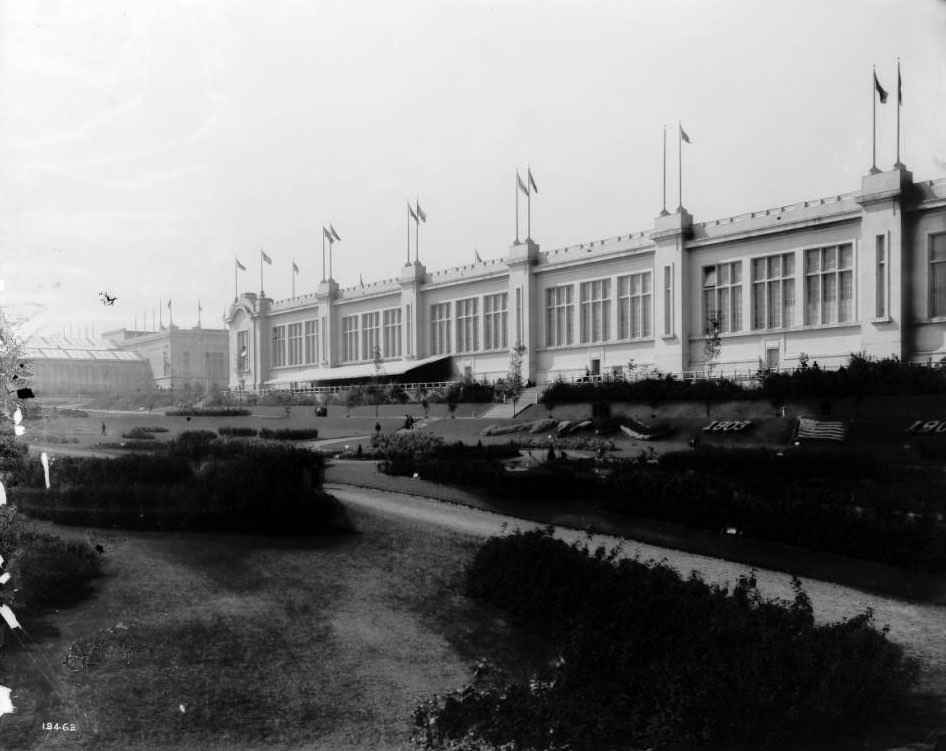 #94 Fairgoers stroll through the gardens outside the Agriculture building at the Louisiana Purchase Exposition, 1904