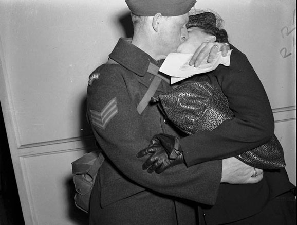 #11 Soldier locked in a passionate embrace on return to Toronto, 1940s