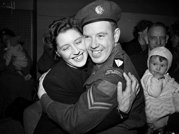 #12 All smiles as a soldier returns from the second world war, 1940s
