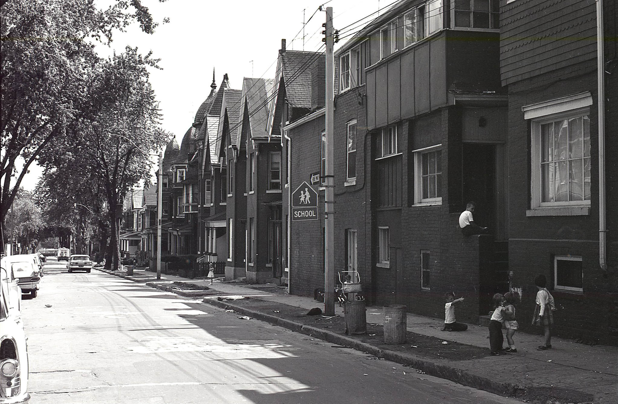 #169 A view looking south on Ontario St. from Wellesley St., 1963. Practically none of these houses exist today.