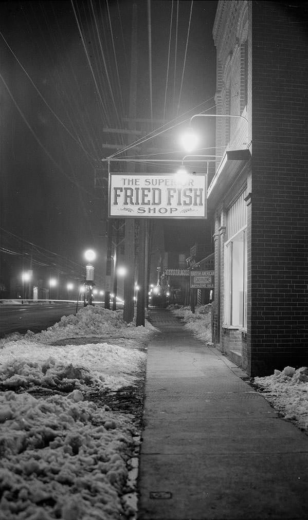 #89 Night view looking north to The Superior Fried Fish Shop, 1887 Yonge Street, Mar. 9, 1923.