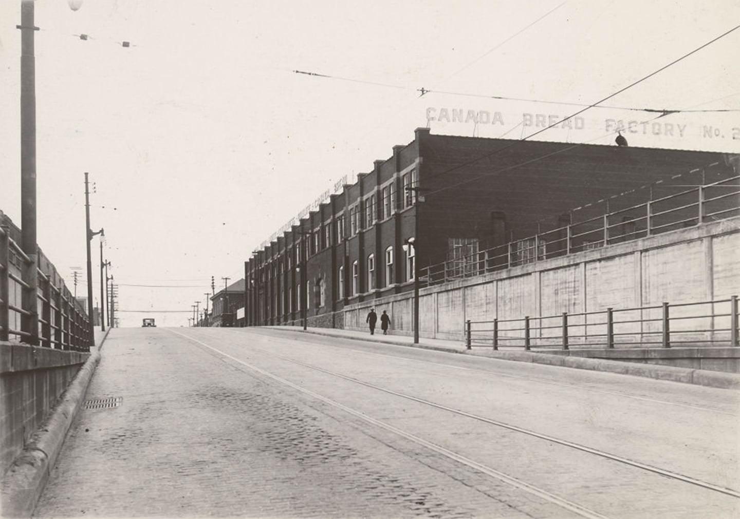 #92 View looking west on Bloor St. W., to Dundas St. W., Canada Bread Company’s Factory No. 2 stands prominently here, 1929