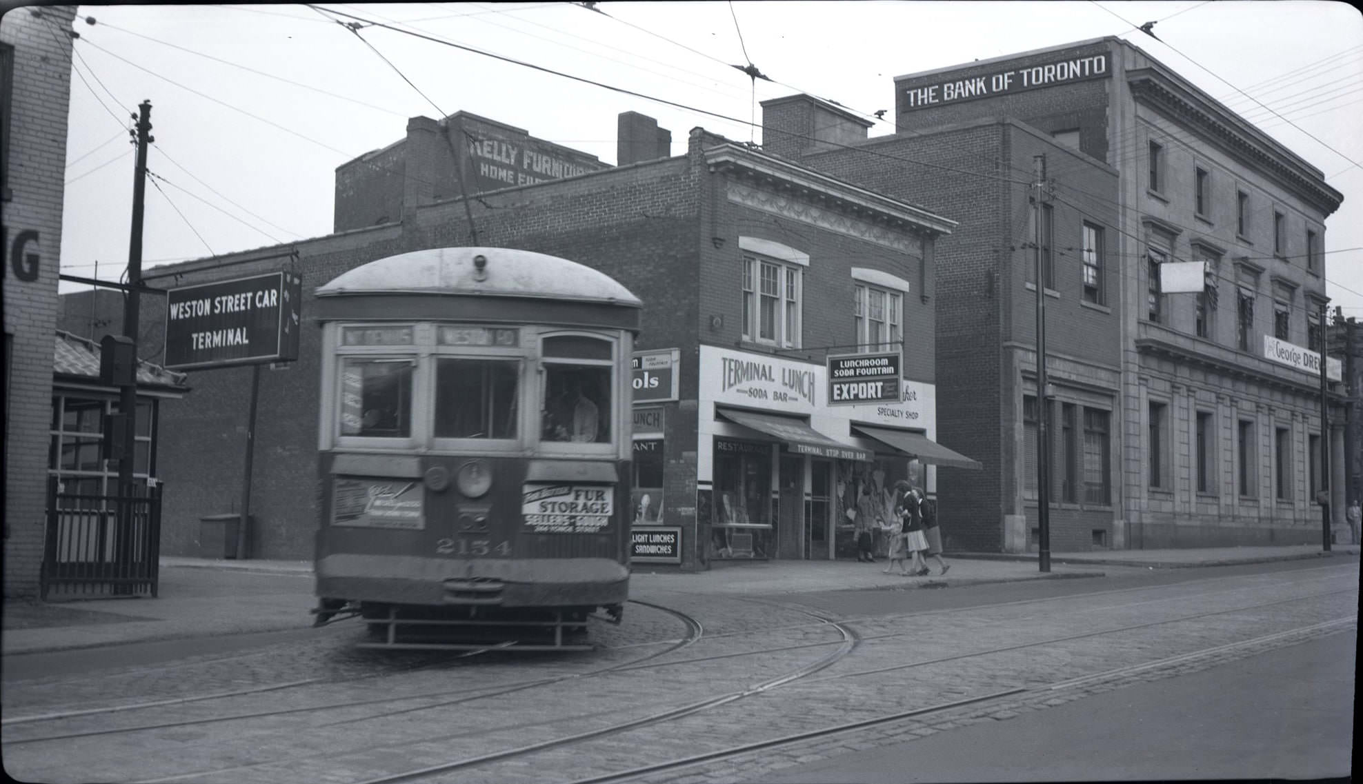 #93 TTC Streetcar 2154 turning north from the old Keele Terminal just north of Dundas St. W., on the east side of Keele Street, 1948.