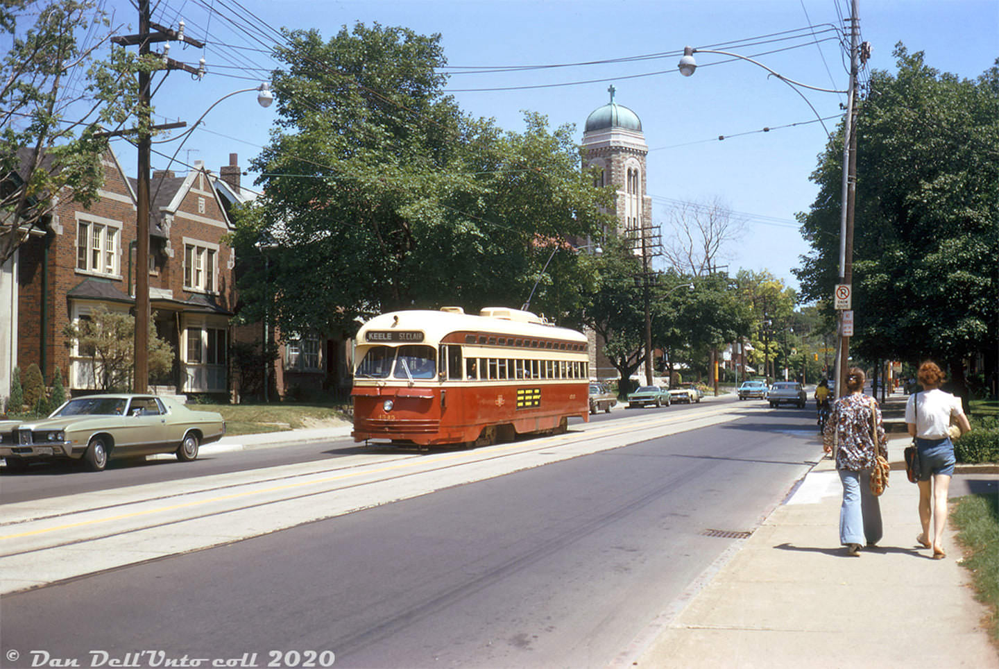 #14 TTC PCC streetcar 4545 heads westbound on St. Clair Ave. East near Our Lady of Perpetual Help Catholic Church on a sunny Summer afternoon in 1972, after coming down Mount Pleasant Ave. from Eglinton loop at the end of the St. Clair route.