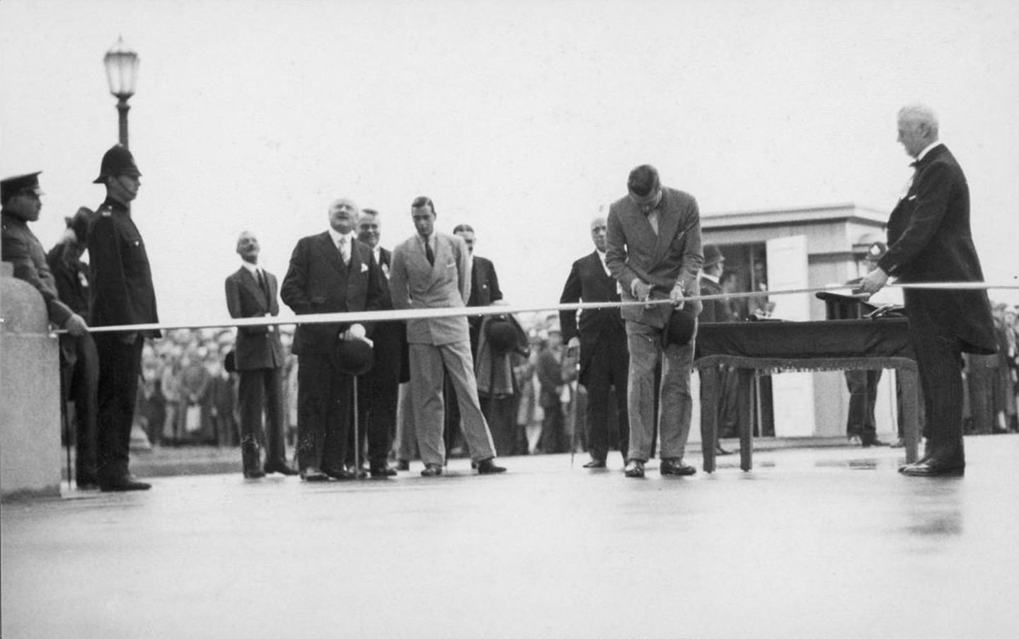 #102 Cutting the ribbon at the formal opening ceremony for the CNE’s Princes’ Gates, Aug. 30, 1927.