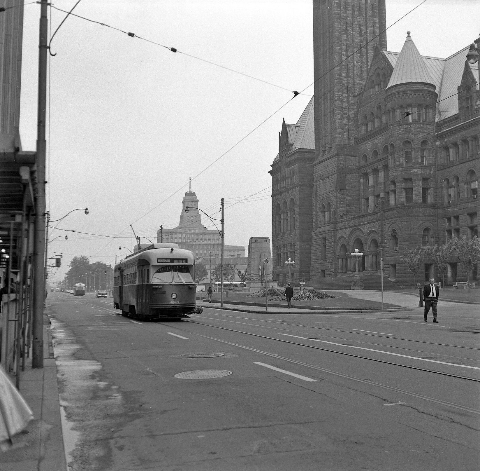 #42 TTC Streetcar 4643 Kingston Road line heading eastbound on Queen Street West at Bay Street. 5 July 1968.