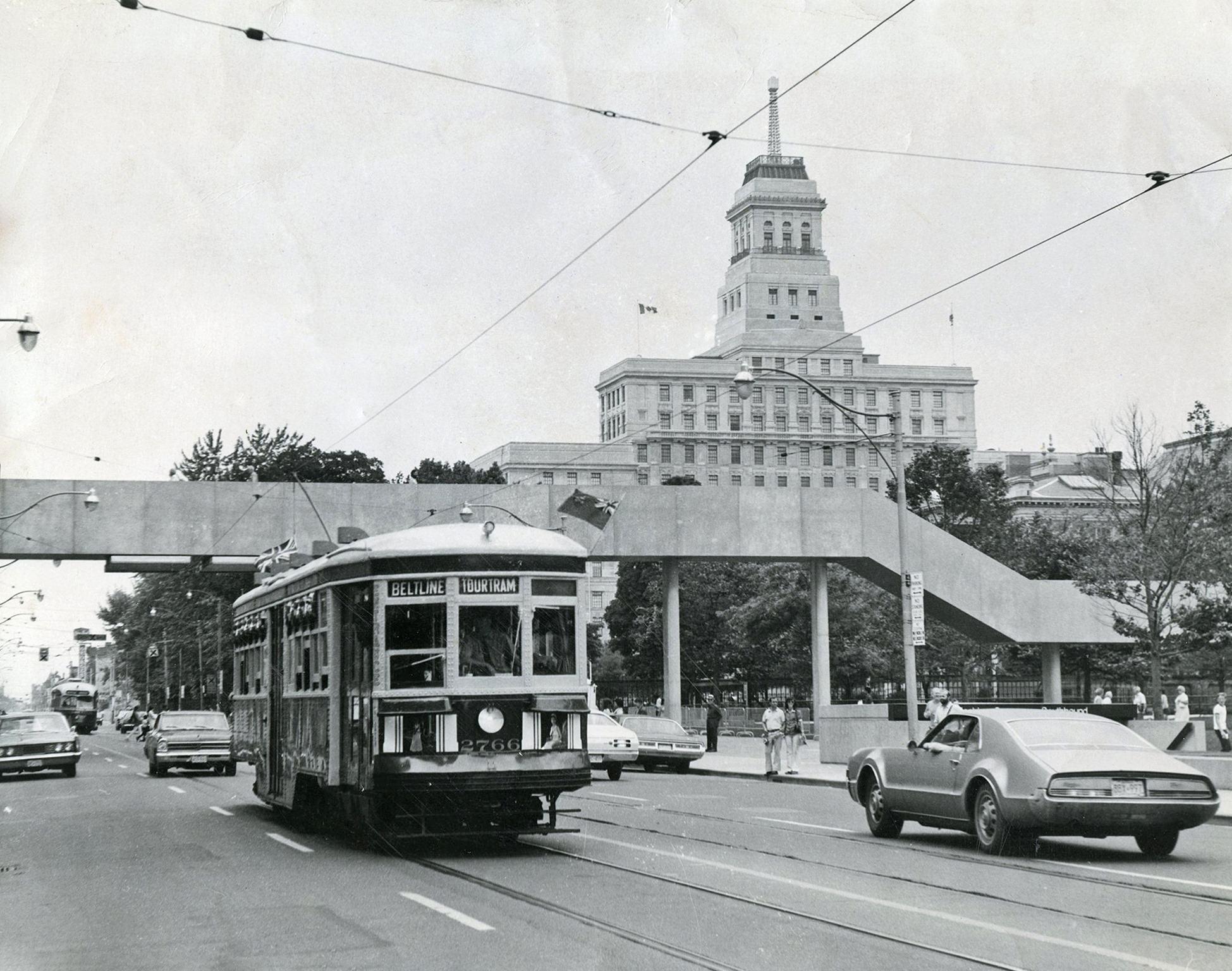 #88 TTC Streetcar 2766 travelling eastbound on Queen Street West, near Bay Street, July 1973.