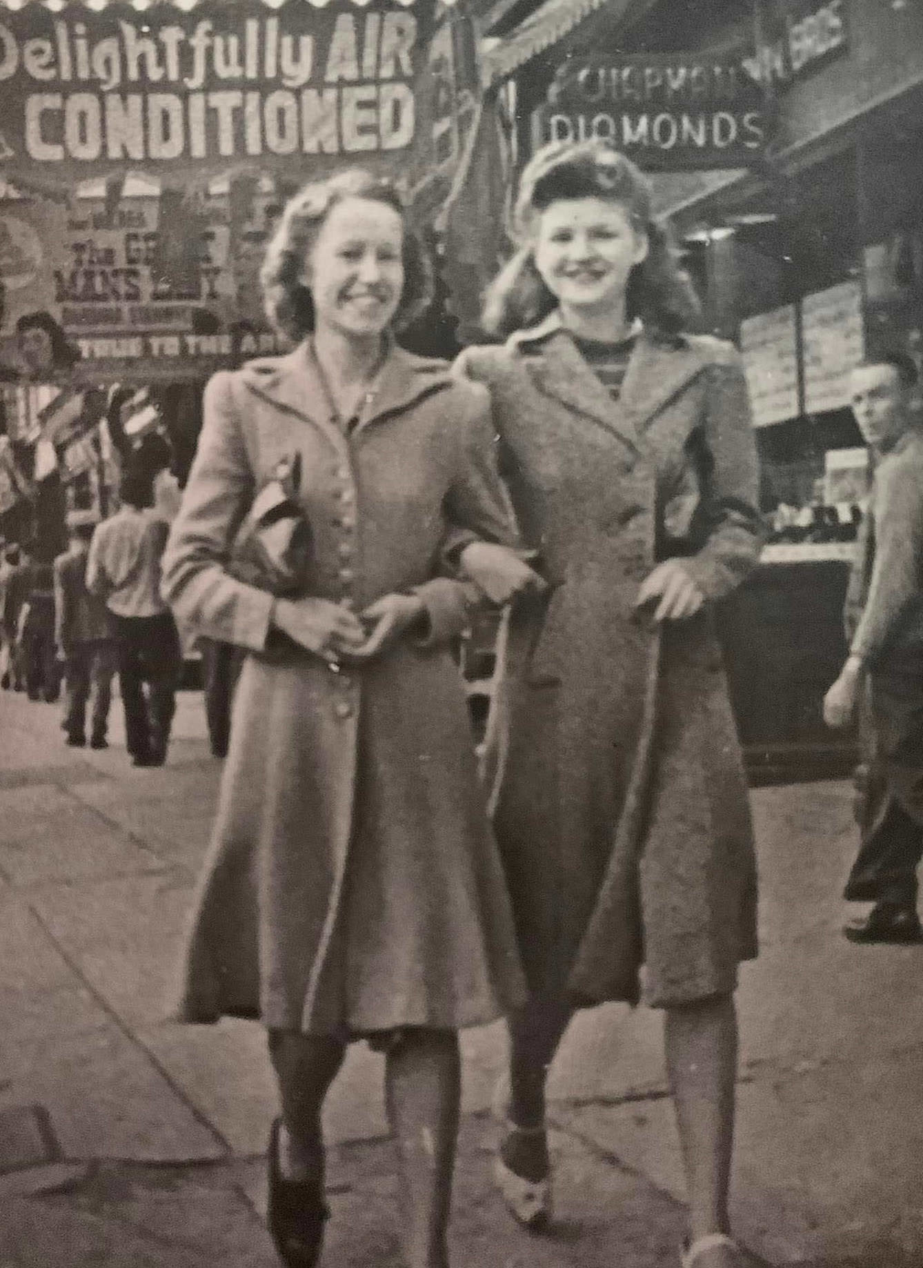 #15 Two women walking on the street downtown Toronto early 1940s