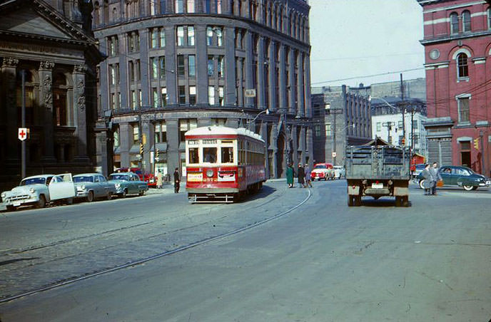 #101 TTC Streetcar 2572 heading westbound Front & Yonge 18 Mar 1954.