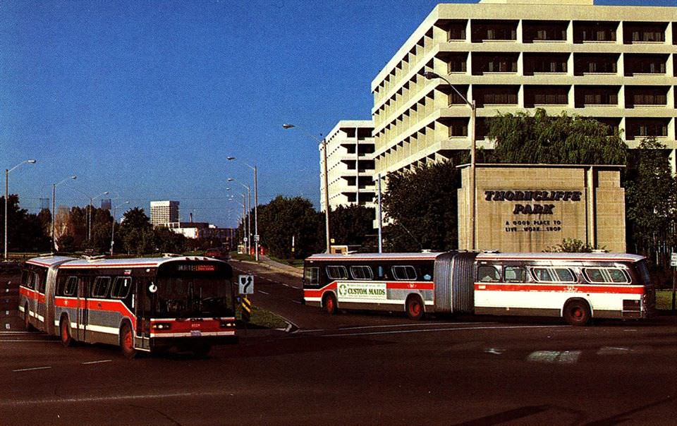 #100 Ted Wickson shot of some brand new Toronto Transit Commission General Motors Diesel Division articulated buses at Thorncliffe Park around 1982.