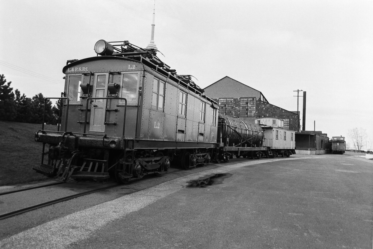 #102 A lineup of railway artifacts. From the railway museum at Harbourfront, 1980.