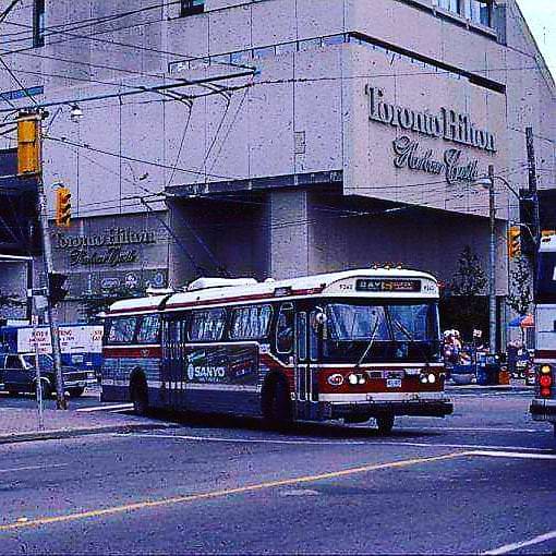 #111 TTC Flyer Trolleybus passing the Harbor Castle Hilton September 8, 1985.