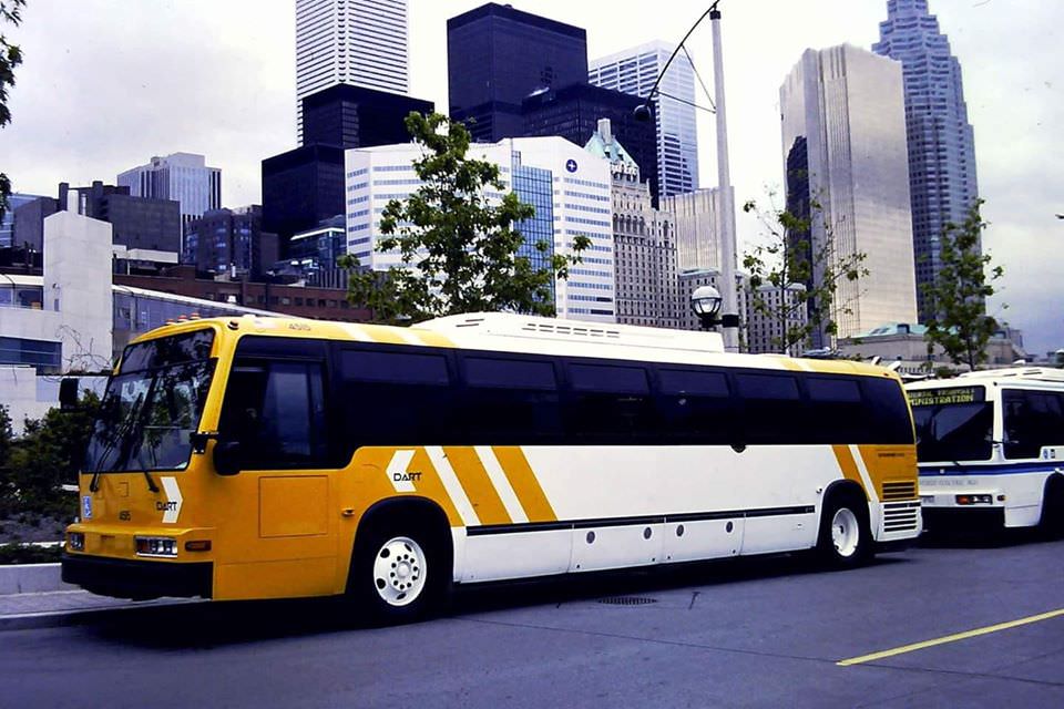 #54 Dallas Area Rapid Transit (Dart) bus in Toronto on a American Public Transit Association convention in 1998 along with other demonstrator buses.