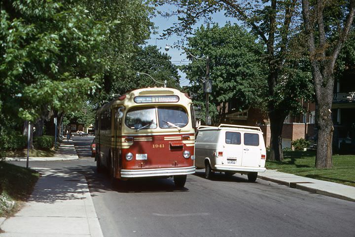 #135 Forest Hill bus on Lonsdale wb at Baker st., 1973