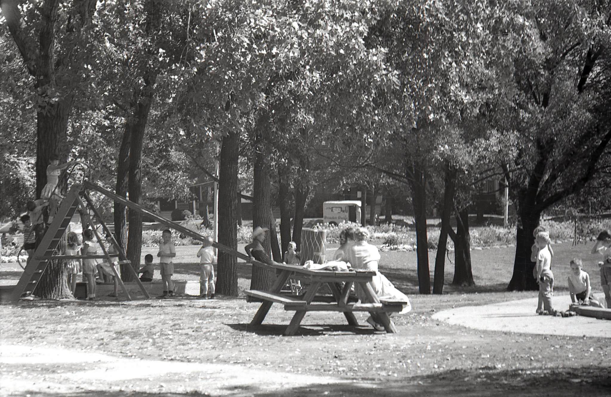 #6 Withrow Park wading pool, looking northwest toward Logan Avenue, 1960s.