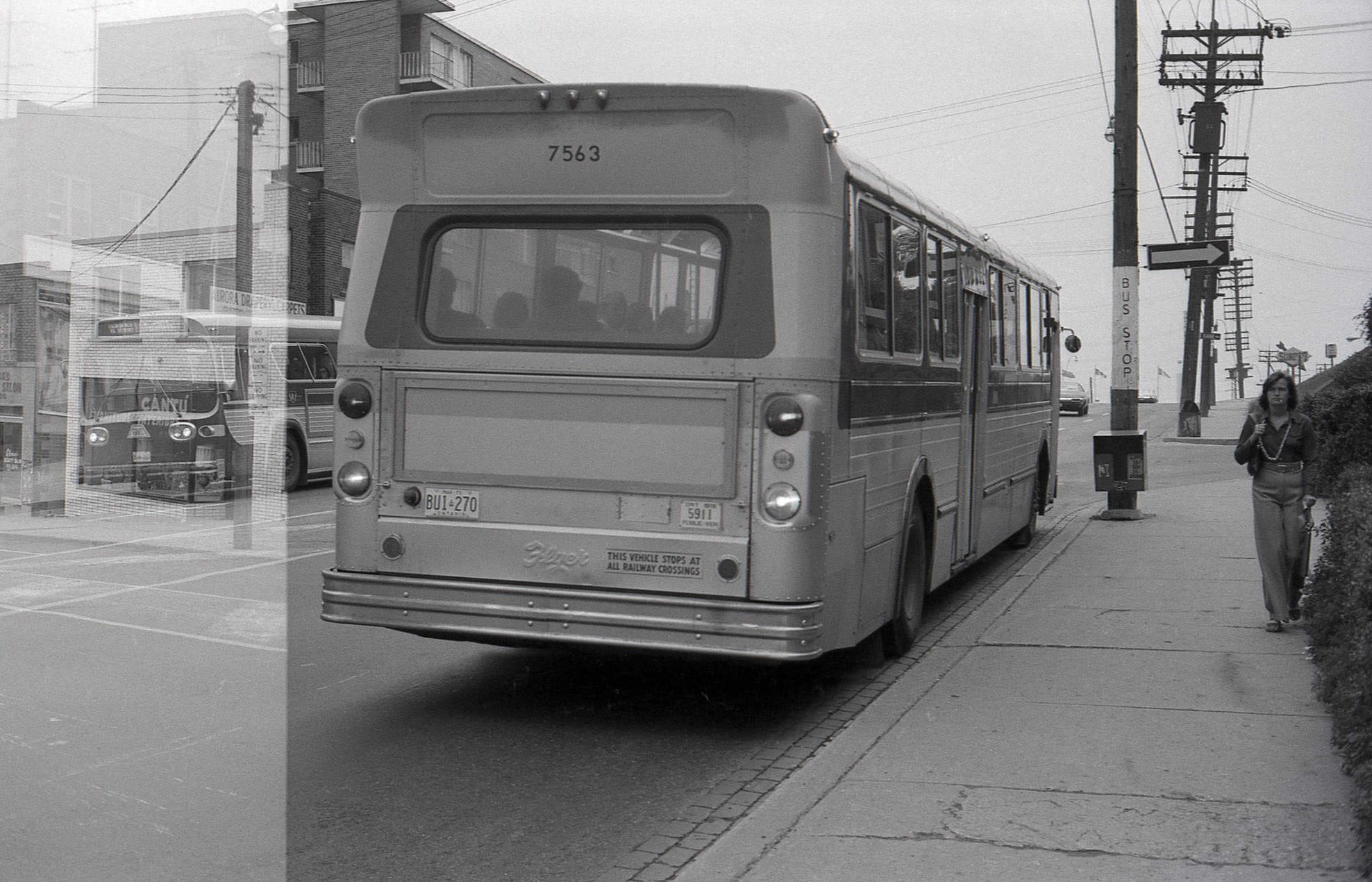 #93 TTC Bus 7563 heading east on Eglinton West, at Kane Avenue TTC bus 7721 can be seen in the background in the second image, heading west on Eglinton Av W., 1974