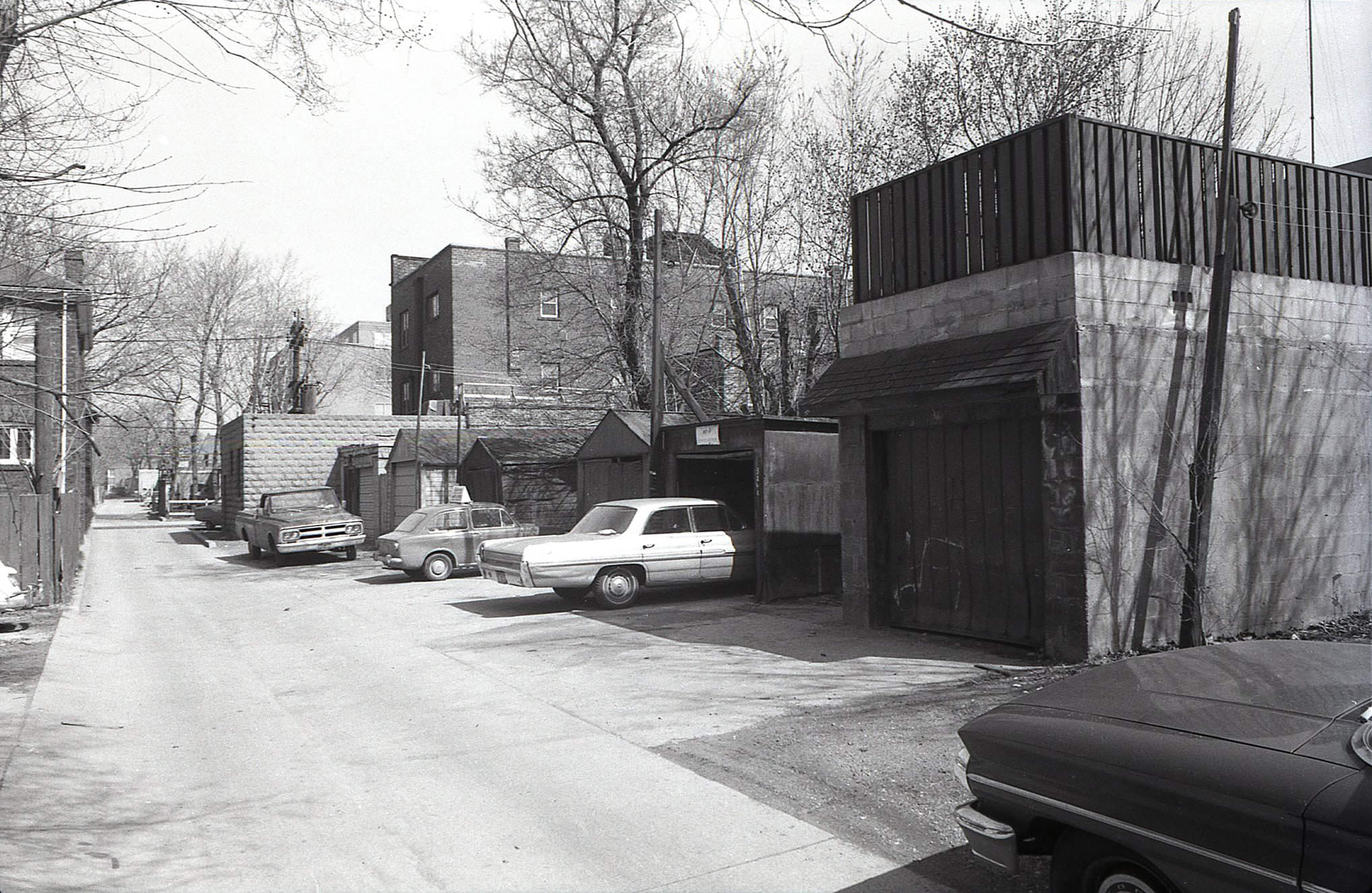 #114 The laneway behind 3228-3250 Yonge (west side of the street), looking north from Cranbrooke Ave., April 1969.