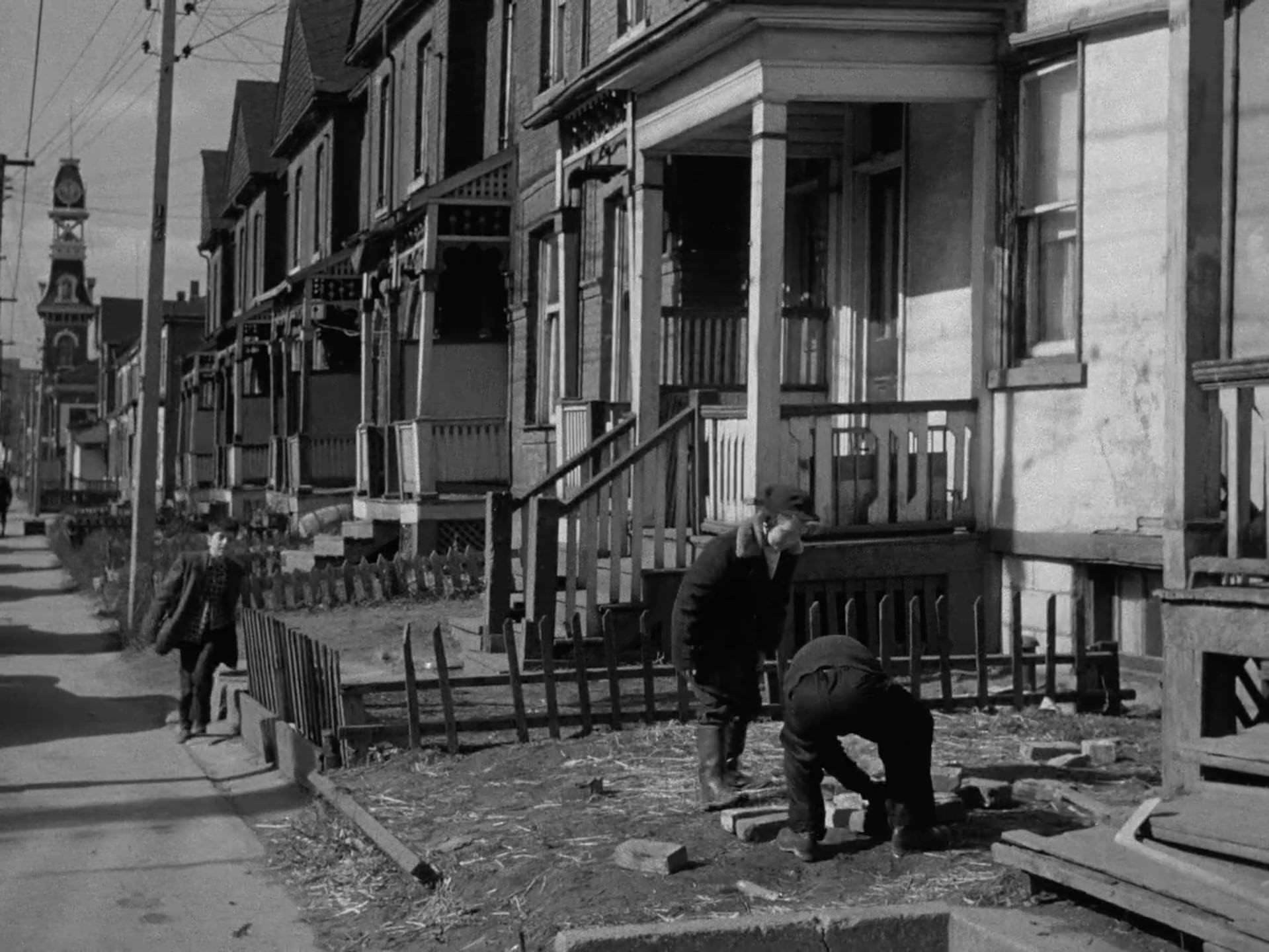 #63 North side of Dundas St. E., looking west to TFD Fire Station 7 at Parliament St. – A still from ‘Farewell Oak Street’, 1953