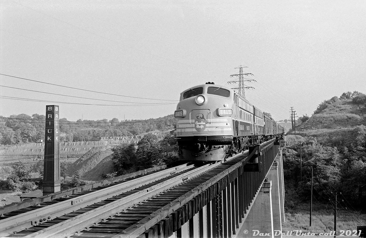 #65 A Canadian Pacific passenger train lead by nearly new FP9 1415 heads southbound down the Don Branch bound for Toronto’s Union Station, 1954