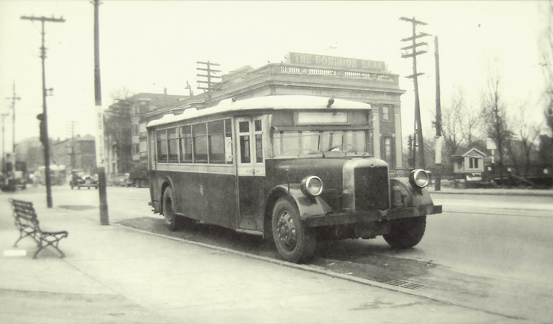 #80 A TTC bus parked on the south side of Bloor St. E., view looking northwest to Sherbourne St., 1945.
