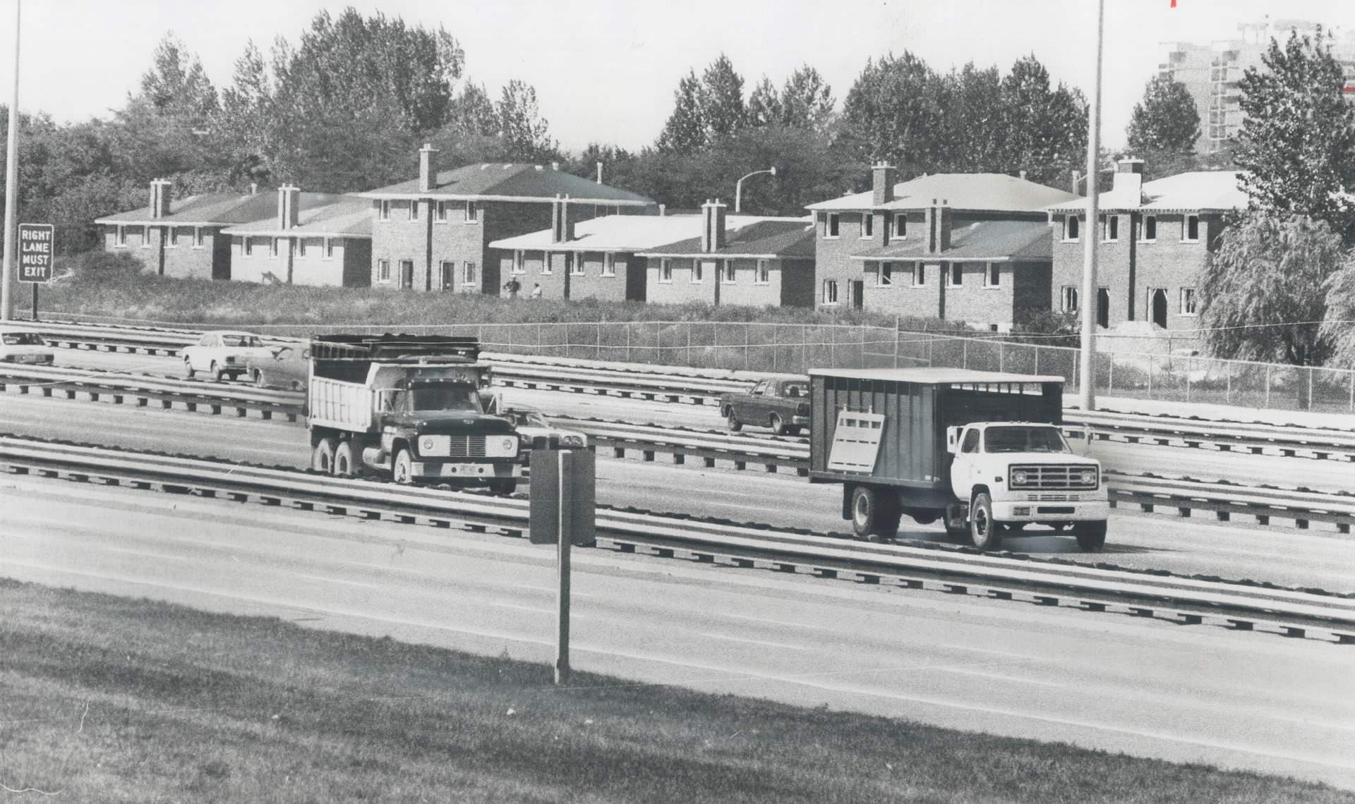 #112 18 Semi-detached houses being built on the north side of Highway 401 near CFTO television station on Snowhill Cres, 1975