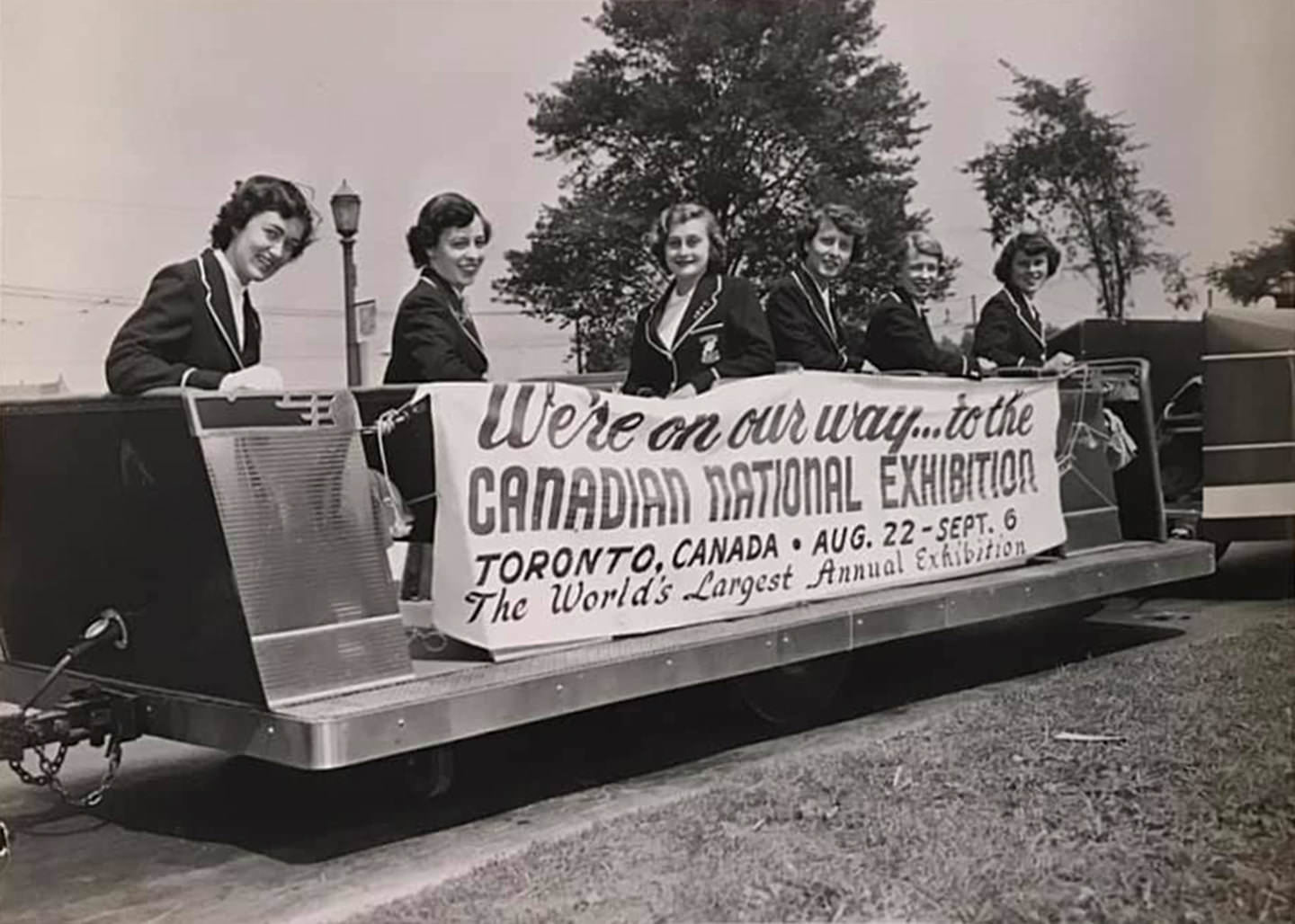 #73 Eaton’s representative, early 1950s, during a parade downtown.