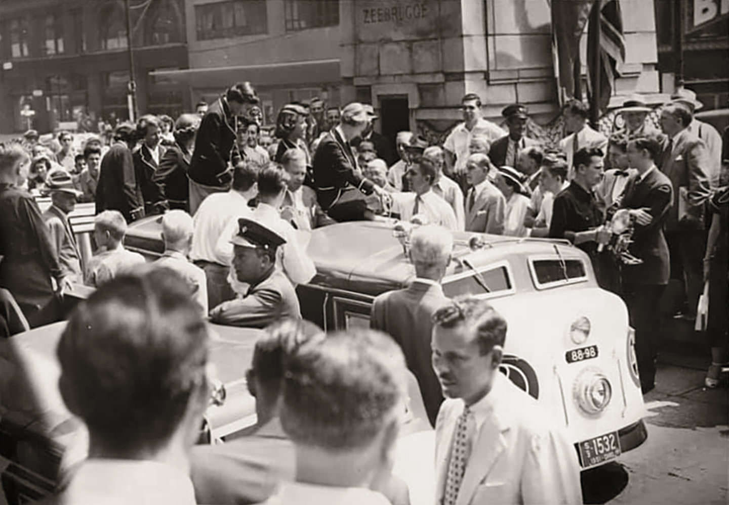 #74 Eaton’s representative, parked in front of the cenotaph at Old City Hall, early 1950s