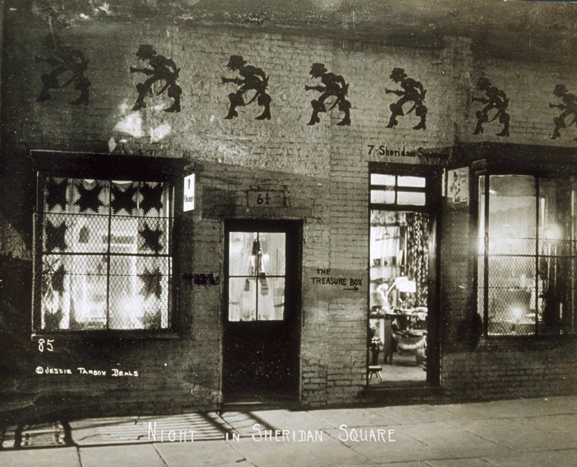 #52 Exterior view of The Crumperie and The Treasure Box at night, 1920