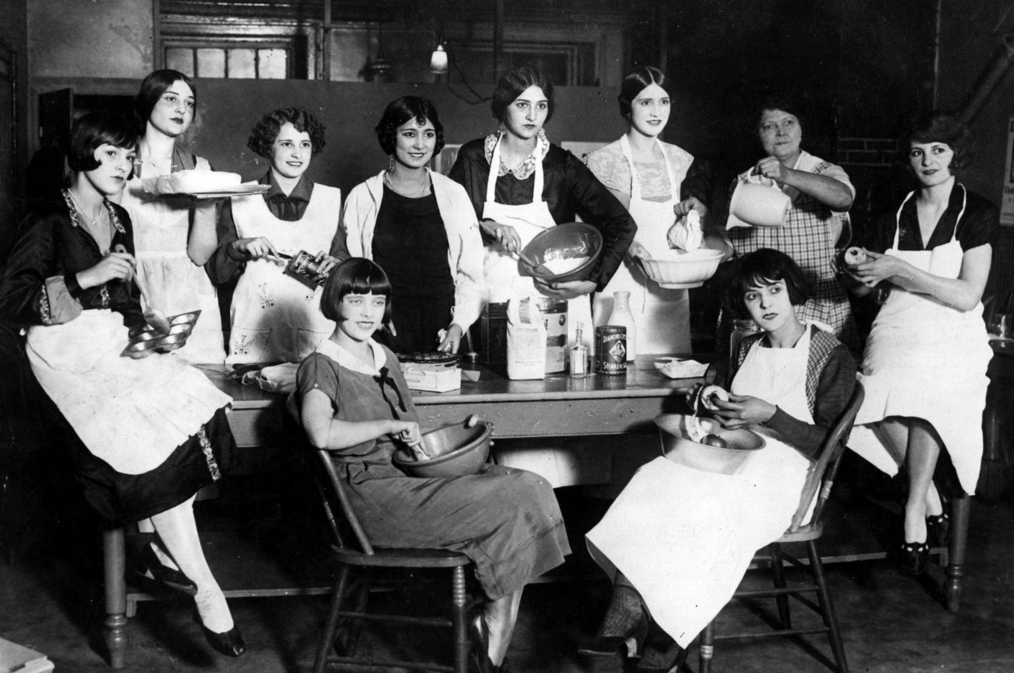 #34 Members of the ‘Greenwich Village Follies’ learning to become good cooks and bakers at the Mary Ryan Tea Room in Greenwich Village, 1925