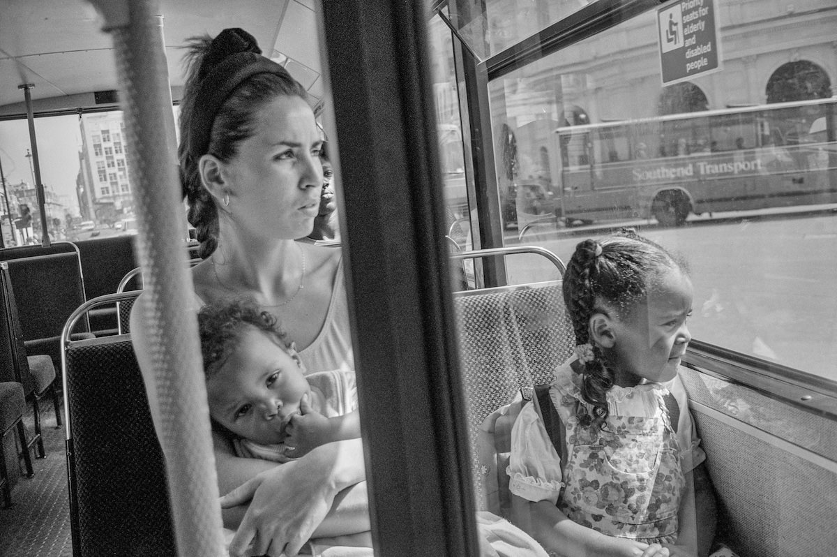 #13 Woman and children, Bus, Charing Cross, Westminster, 1991, 91-8o-43