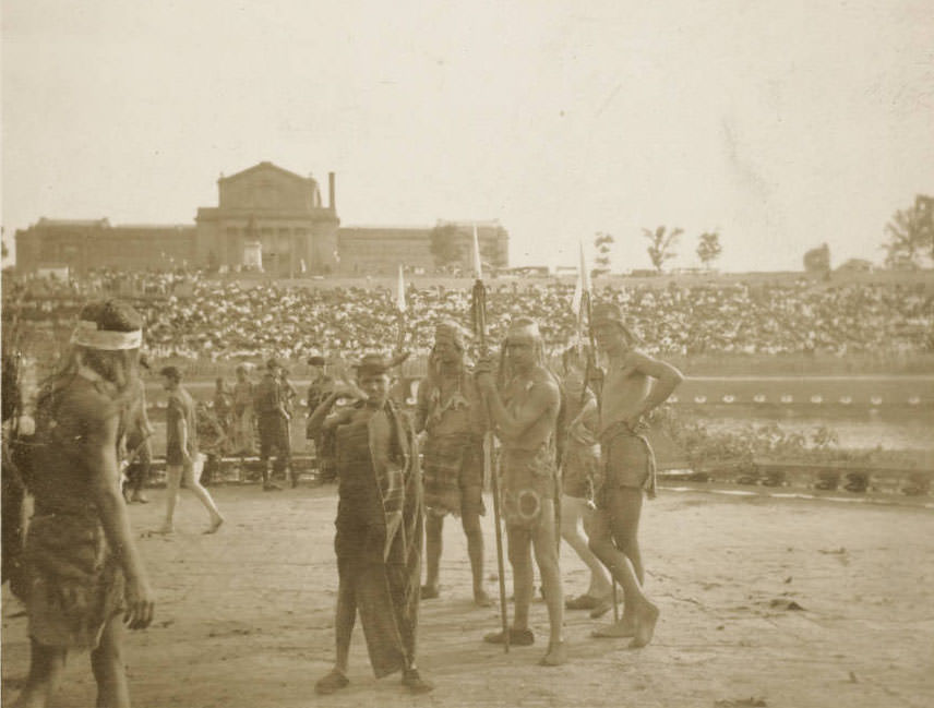 #20 A group of volunteer actors in dress of American Indians stand on the stage of the Pageant, Pageant and Masque of St. Louis, 1914