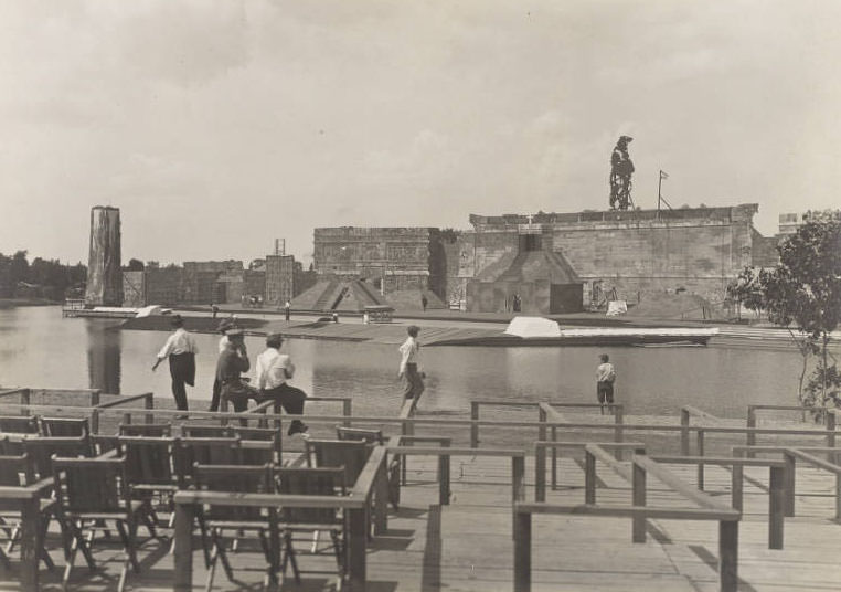 #85 Passers-by look over workers building the set for the Pageant and Masque of St. Louis, 1914