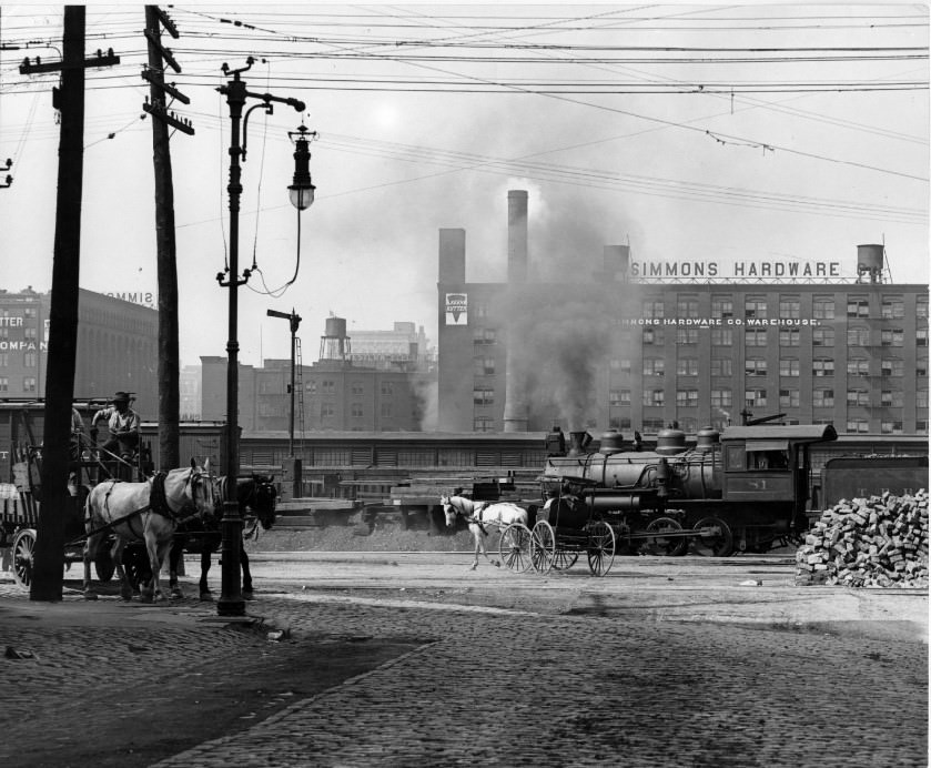 #13 Locomotive in front of Simmons Hardware, 1890