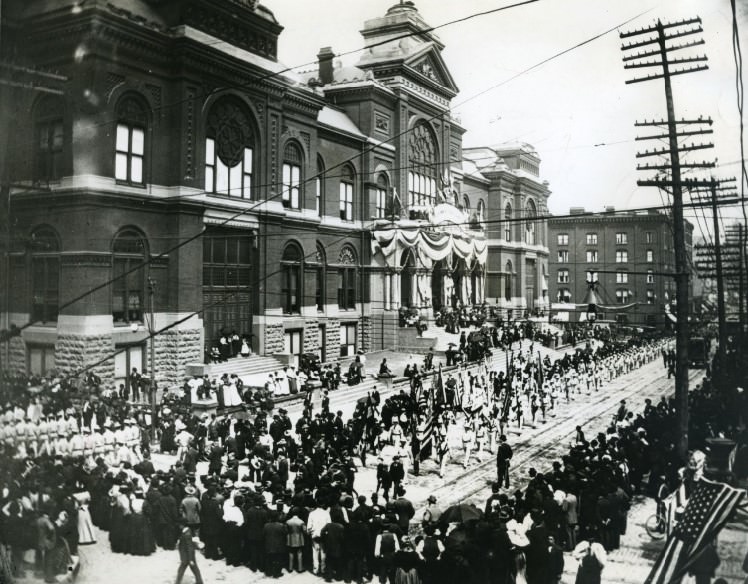 #45 Parade by Exposition Hall, 1898