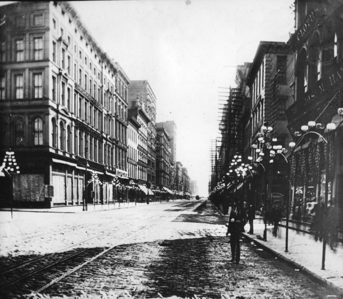 #48 Broadway looking south from Washington. The illumination bug bit St. Louis in 1882 when 140 plumbers scurried to set up gas pipes for lamplit arches along 44 blocks of the business section.
