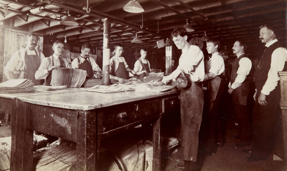 #55 Bundling newspapers, 1899